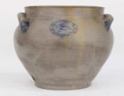 Stoneware Jar w/Sun Face Decoration