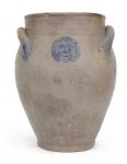 Stoneware Jar w/Sun Face Decoration